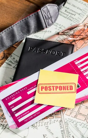 Passport and travel documents with a postponed stamp