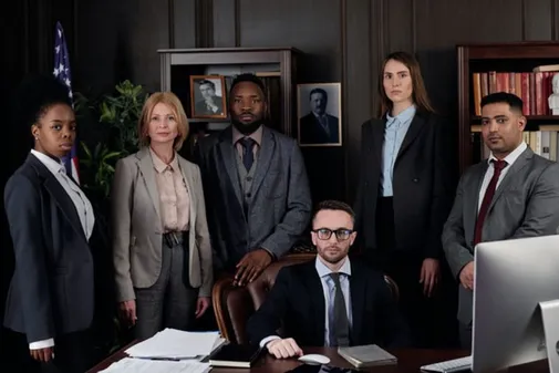 The Misha Sanghi Immigration Law team in their Calgary office
