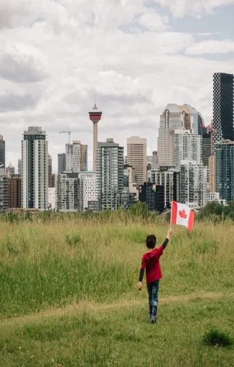 New permanent resident walking in Nose Hill Park, Calgary