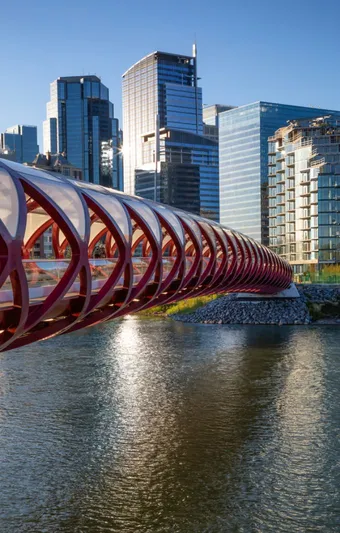 Peace Bridge across the Bow River in Calgary at sunrise